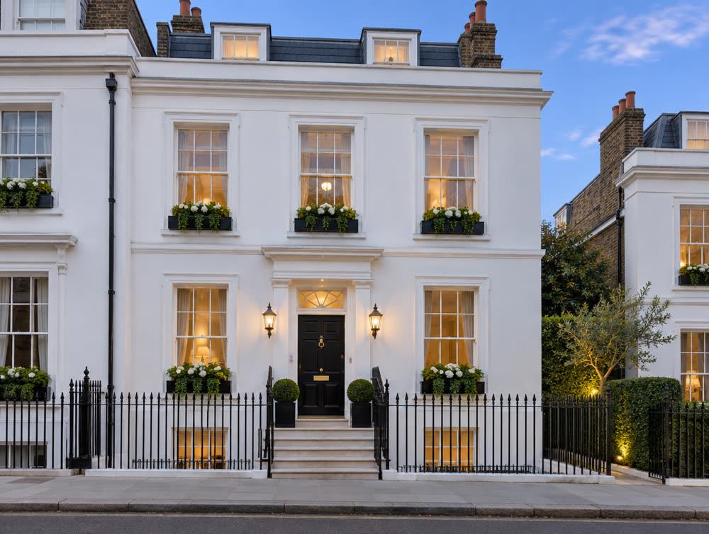 A white stucco townhouse